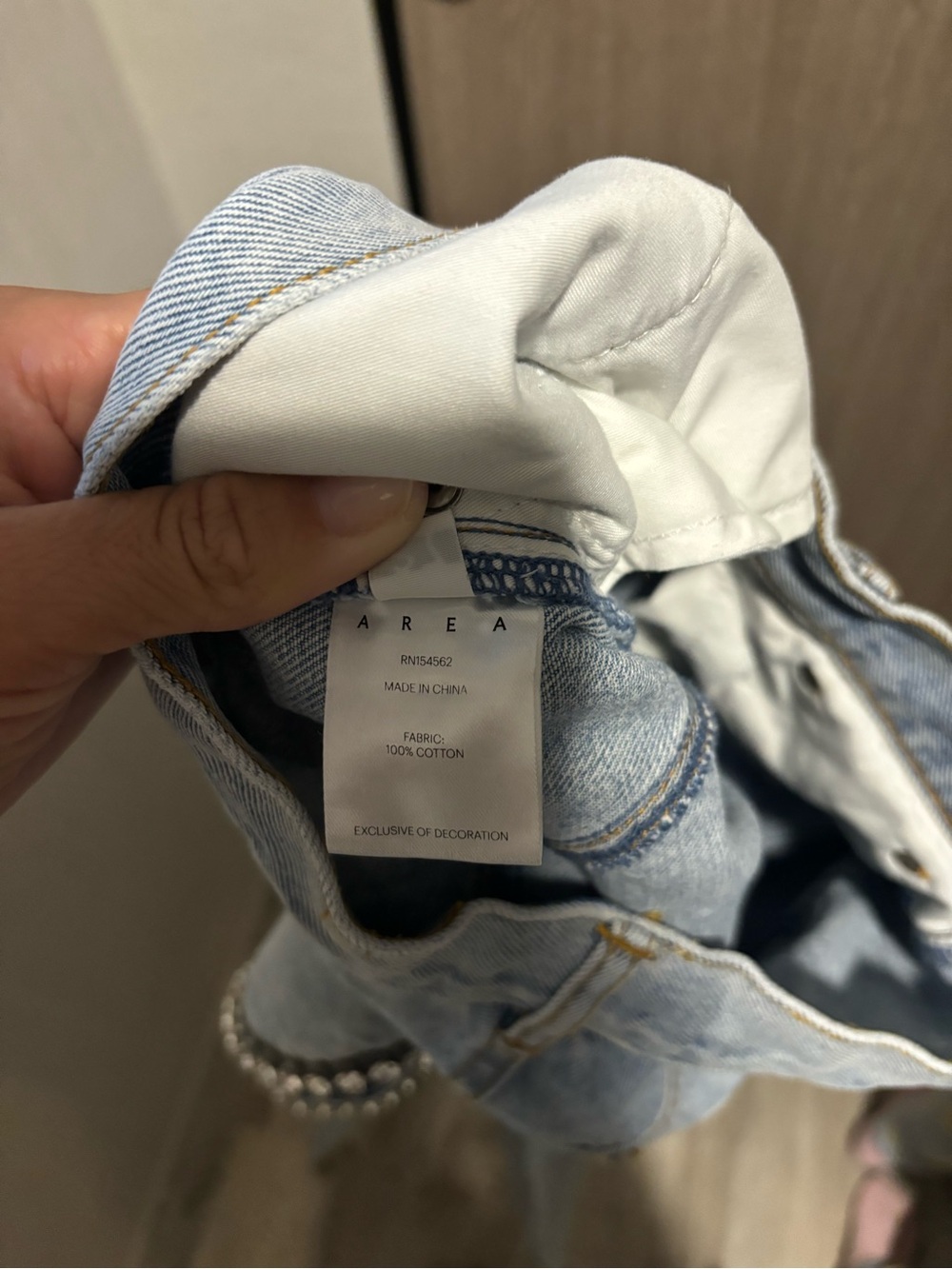 AREA Light Wash High‑Rise Jeans with Embellished Cutouts - Picture 4 of 5